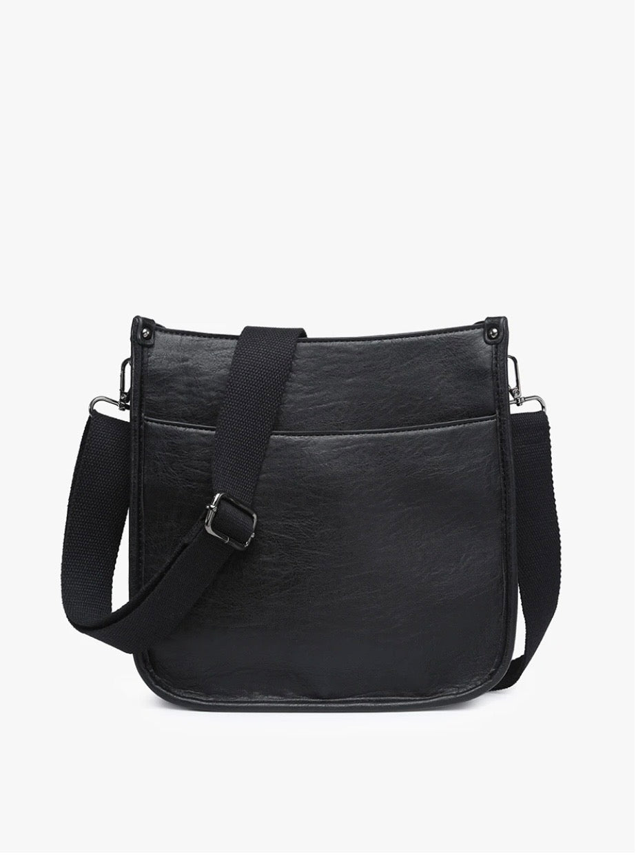Interior view of the Black Posie crossbody bag showing herringbone lining and interior zip pocket